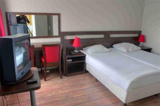 Hotel Damrak Амстердам Стая снимка